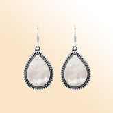 Sterling silver teardrop Mother of Pearl earrings with shimmering gemstone and detailed Bali beaded design, handcrafted artisan jewelry for women.